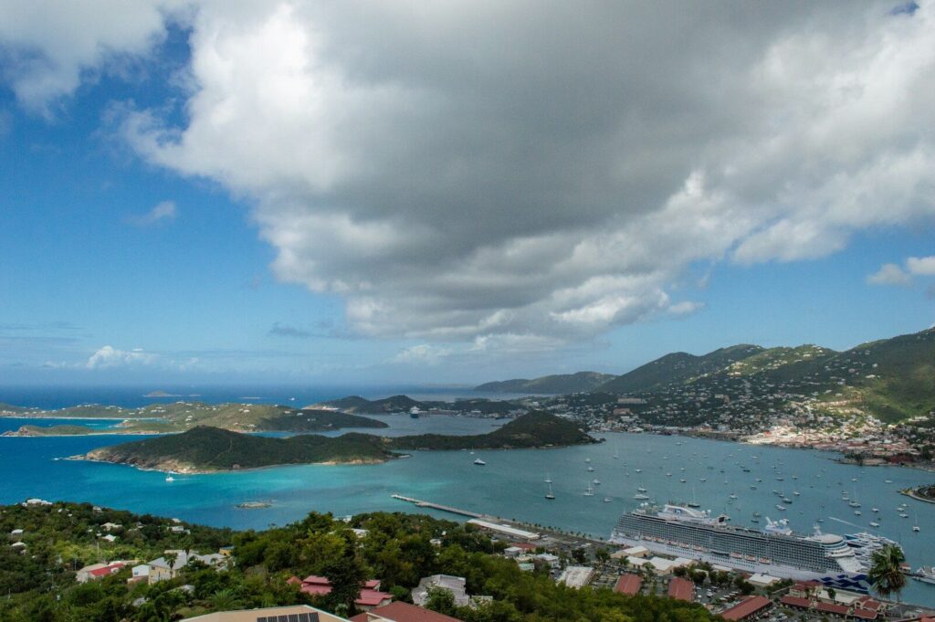 a view of a harbor with boats in the water